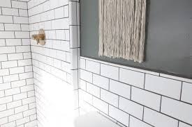 Subway tile has been around for over a century. Our Modern Subway Tile Bathroom Bright Green Door