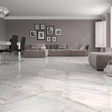 From a structural standpoint, tile works best in bedrooms that are on the first floor of the house or in a room built on a concrete slab. These Flooring Ideas Will Be Great For Your Livingroom Livingroom Flooring Homeimprovment Learn More A Living Room Tiles White Tile Floor Floor Tile Design