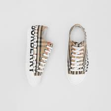It was designed in 1901 sporting the latin word prorsum, meaning forwards. Logo Print Vintage Check Cotton Sneakers In Archive Beige Women Burberry