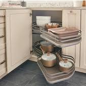 Kitchen pullout shelves are much easier to clean and maintain than a traditional shelves because you can pull them out to wipe down every corner of the drawer. Corner Organizers Shop For Blind Corner Kitchen Cabinet Optimizers And Corner Units In Heavy Duty Chrome