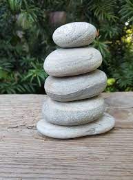 You can place the rocks in the brook's channel to give it a more natural look. 21 Exciting River Rock And Stone Garden Decorating Ideas For Your Outdoor Space Garden Stones River Rock Zen Garden