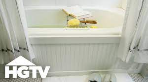 Trim pieces are needed to make a transition from the thicker surround wall to the drywall around it. How To Frame Your Tub With Beadboard Hgtv Youtube