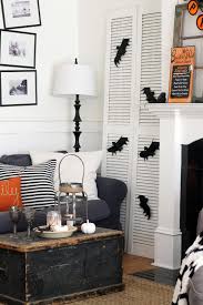 Black And White Halloween Decor Black White And Orange Halloween Decorating In Our Living Room The Wicker House Halloween Living Room Living Room Decor Room Decor