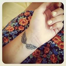 Black And White Angel Wings Tattoo Designs Wing Tattoo Wrist Tattoo Black And White Angel Wings Tattoo Pretty Flower Dress Floral Dress Tattooed I Want With Images Wing Tattoos On Wrist Neck Tattoo Tattoos