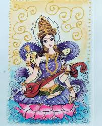 She is white in color, seated on a simply drawn large white lotus. Card Contest In Ic Block Puja Telegraph India