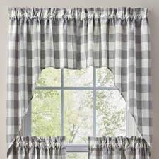 A draped fabric valance that falls gracefully from the top of a window, on both sides, in swooping, downward directions. Wicklow Check Swags Dove Grey Complete Your Country Farmhouse Home With Our Wicklow Check Grey Swags Colors Curtains Kitchen Curtains Modern Kitchen Curtains