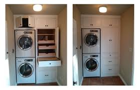 These cabinets are built from wall to wall so you get to use every inch of space. This Is A Built In Laundry Cabinet I Built This Cabinet Has A Hidden Folding Table In The To Open Plan Kitchen Living Room Laundry Cabinets Laundry Mud Room