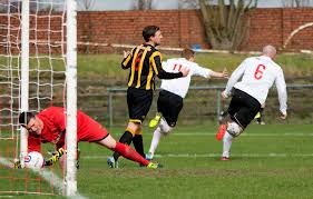 Andy Leishman retrieves the ball from his net as Bankies s…