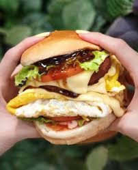 It's the bars iteration of ramly burger, with a tom yum beef patty and homemade truffle egg mayo between a soft brioche bun. Malaysian S Favorite Street Food Ramly Burger Is Here In Singapore Merlionpost