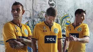 El club atlético rosario central, conocido simplemente como rosario central, rosario o central, es una entidad deportiva argentina de la ciudad de rosario, 6 en la provincia de santa fe, cuya principal actividad es el fútbol masculino, en el que participa de la primera división de argentina. Camiseta Alternativa Under Armour De Rosario Central 2019 Tsc