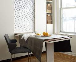 It's crafted from a mix of solid and engineered wood in a light brown and espresso hue that blends in easily with any color palette. 8 Smart Solutions If You Don T Have A Dining Room