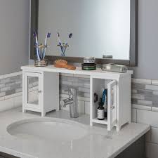 The Over The Sink Storage Organizer Hammacher Schlemmer Bathroom Sink Storage Sink Storage Sink Shelf