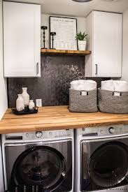 The laundry room from hgtv green home 2012 features a gorgeous black tile wall and modern countertops that make the space extra functional. Small Laundry Room Makeover Taryn Whiteaker