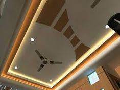 When we come to the ceiling design color, we have two options to give the ceiling the color we want, the first is to paint the pop designs of the ceiling directly with the selected color, the second option is to install rgb colored ceiling led lights with the chosen color. Living Room Pop Design With Two Fans Interiors Home Design