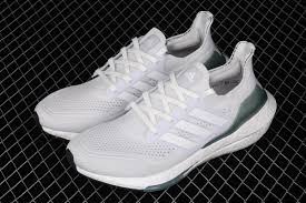 For contrast we see a grey heel counter, a. Adidas Ultra Boost 2021 Crystal White Hazy Green For Sale Hoop Jordan