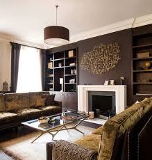 Dark Chocolate Accent Wall With Gold Wall Sculpture Much Darker Than What I Normally Brown Living Room Brown Living Room Decor Contemporary Living Room Design