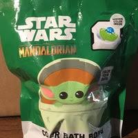 The image features the character baby yoda comfortably drinking from a mug with both its hands on the cup. Toyzonline Mercari