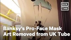 In a video shared to the artist's instagram, the anonymous graffiti genius is seen entering a carriage in a hazmat suit, face mask and goggles. Banksy S Artwork Promoting Face Masks Removed From London Train Nowthis Youtube