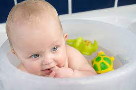 A long drain tube allows the bath to be easily drained without having to lift the bath. How To Bath Your Baby In An Upright Bathtub All You Need To Know Live With Less