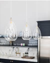Proper illumination over your island doesn't just look nice but it makes for a safer and cleaner kitchen. How To Pick The Right Pendant For Your Kitchen Island Fritz Fryer Lighting
