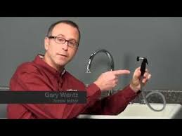 These models have what we call diverters built in, ready second, slide the sprayer through the hole. How To Repair A Sink Sprayer Youtube