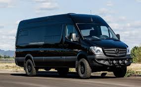 Black Mercedes Sprinter Van Parked On Road Van Mercedes Van Mercedes Camper