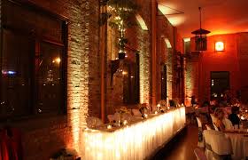 Yellow Uplighting Provided By All Star Music For A Wedding Reception At Lakefront Brewery In Milwaukee W Wedding Venues Wisconsin Wedding Reception Uplighting
