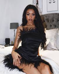 A New Classic The Black Satin Bandeau Feather Mini Dress Styled By Jaydepierce Mini Dress Outfits Black Satin Mini Dress Satin Mini Dress
