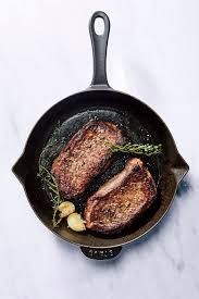 I think the best way to cook a ribeye steak is in a cast iron pan on the grill. Pan Seared Strip Steak This Recipe Is One Of Our Highest Rated Recipes Ever Most Of The Praise Is Due To Cooking Light Recipes How To Cook Steak Strip Steak