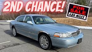 Image result for Light Ice Blue 2006 Town Car