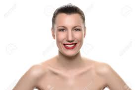 An updo hairstyle for long hair is a stylish way to tame your tresses. Happy Confident Young Woman Wearing A Tube Top With Her Long Hair Tied Back In A Ponytail Looking At The Camera With A Lovely Beaming Smile Of Pleasure Isolated On White Lizenzfreie