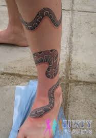 The snake eyes tattoo has many meanings. Snake Leg Tattoo Designs Tattoos Amp Piercings Pinterest Around Arm Tattoo Leg Tattoos Snake Tattoo Design