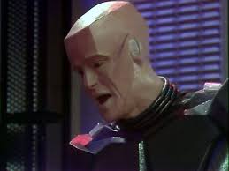 KRYTEN: Oh, and, er, who's that, there? and old girlfriend, Mr Arnold, sir?  RIMMER: Hardly. KRYTEN: Ah, no. Not really your type, I suppose