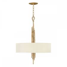 Delta's champagne bronze finish (top), which almost looks like brushed gold, looks attractive against natural stone and would work well with any warm or neutral palette. Elstead Spyre 6 Light Pendant Champagne Gold Or Metallic Matte Bronze Chandeliers From Envogue Lighting Uk