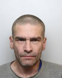 Police photo of boorish drunk who 'booted' woman at BBQ