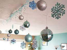 Hang the frame on the wall from a pretty ribbon tied in a secure bow. 15 Christmas Ceiling Decorations To Make Christmas Special Christmas Celebration All About Christmas Christmas Ceiling Decorations Ceiling Decor Christmas Hanging Decorations