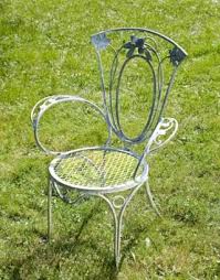 The less expensive casual furniture—including those metal lawn chairs—had been replaced. Wrought Iron Outdoor Furniture Vintage Iron Patio Furniture