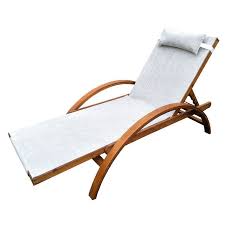With a removable footrest make a cozy seat around the fire. 76 Long In 2021 Teak Chaise Lounge Wooden Patios Patio Lounge