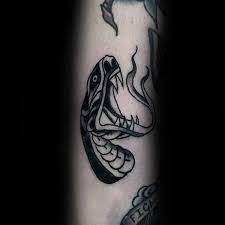 It seems there was confusion when the palagi's started recording information and they probably pointed to the back of a man's tattoo and asked what is was and so was told the name of the part on. 70 Traditional Snake Tattoo Designs For Men Slick Ink Ideas