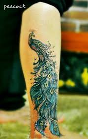 The hummingbirds are seen by many ethnic groups as symbols of life and prosperity, joy and love. Peacock Feather Tattoo Designs Peacock Tattoo Peacock Feather Tattoo Leg Tattoos