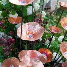 Outdoor sculpture, statue and decor pieces. Copper Poppies In The Garden Garden Art Garden Crafts Copper Crafts