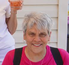 Remove strap from shoe in photo?