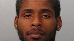 2 men found dead behind warehouse identified