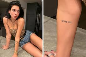 These are all of the tattoos that dua lipa currently has: 10 Powerful Backstories Celebrities Memorialized With Their Tattoos