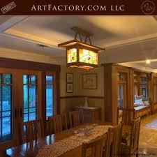 Special rectangular dining table composed by an extra light crystal top with a sandblasted handmade decoration in an exceptional arts & crafts style allen dining table in solid natural cherry wood by frank lloyd wright for. Craftsman Lighting Inspired By The Arts And Crafts Movement