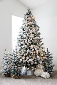 How to decorate a christmas tree with ribbon garland. How To String Garland On A Christmas Tree A Pretty Life In The Suburbs