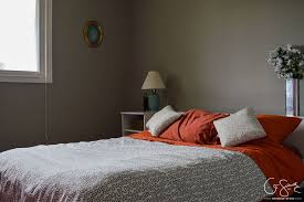 This long island, new york, guest bedroom gets its airy aesthetic from white linens atop a white iron bed and a lucite nightstand. A Simple Guest Bedroom Aka Pink Room Makeover Madness Method
