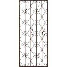 But did you check ebay? Quatrefoil Iron Wall Plaque With Hooks Google Search Metal Wall Panel Metal Walls Wall Paneling