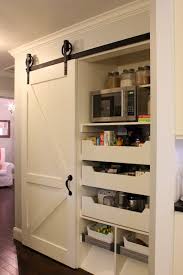 kitchen pantry with sliding barn door
