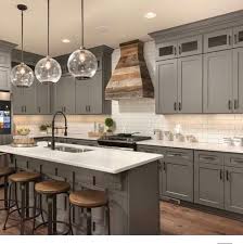 If you want a farmhouse inspired kitchen then check out these 7 inexpensive tips to help give your kitchen a have you always loved the look of a farmhouse inspired kitchen but aren't ready to rip out your old (or new) cabinets and countertops? Farmhouse Lookbook Oh How I Love This One The Gray Cabinetry Rustic Hood And Tile Simply Beautiful From Piper Stromatt Kitchen Farmhouse Rustic Diy Barnwood Farmhousedecor Farmhousestyle Farmhousekitchen Facebook